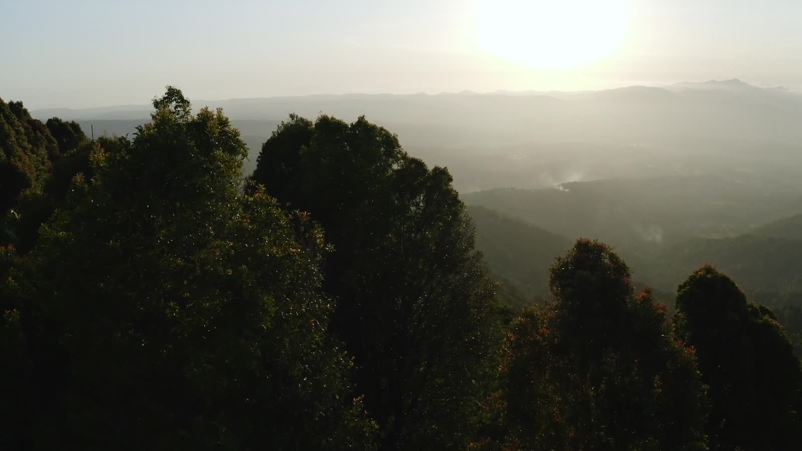 Aerial misty mountains at sunrise